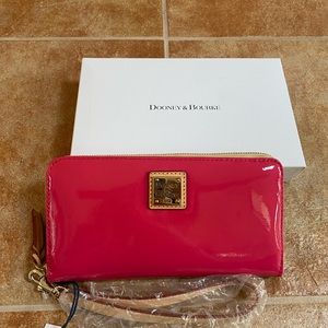 Hot pink, Dooney and Bourke, wallet, new with tags, and its original packaging